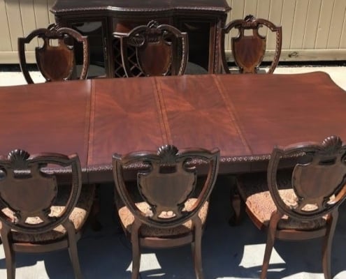 image of beautiful, quality dining room set in driveway