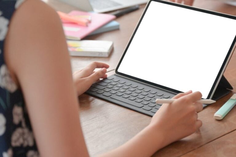 iPad screen with woman looking at it