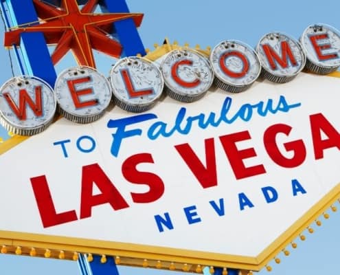 "welcome to fabulous las vegas nevada" sign against blue sky