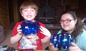 niece and nephew with piggy banks