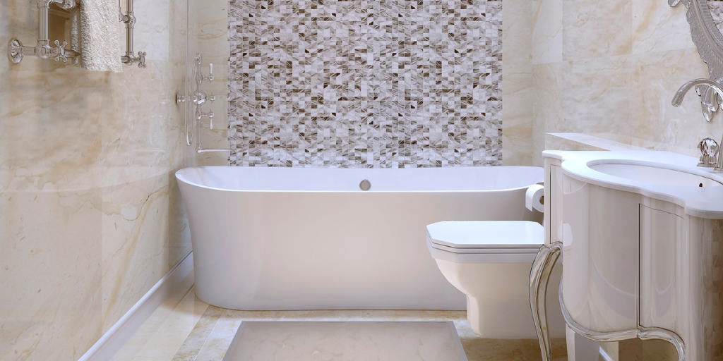 bath tub and european toilet with a mosaic tile background