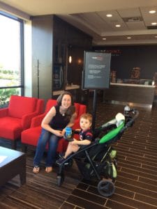 author with son in stroller at PurePoint bank