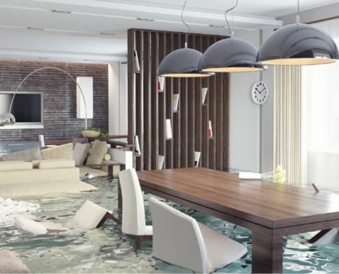 home dining room with flood damage, in flood waters