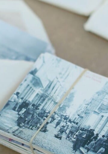 envelopes filled with old photos and genealogy research