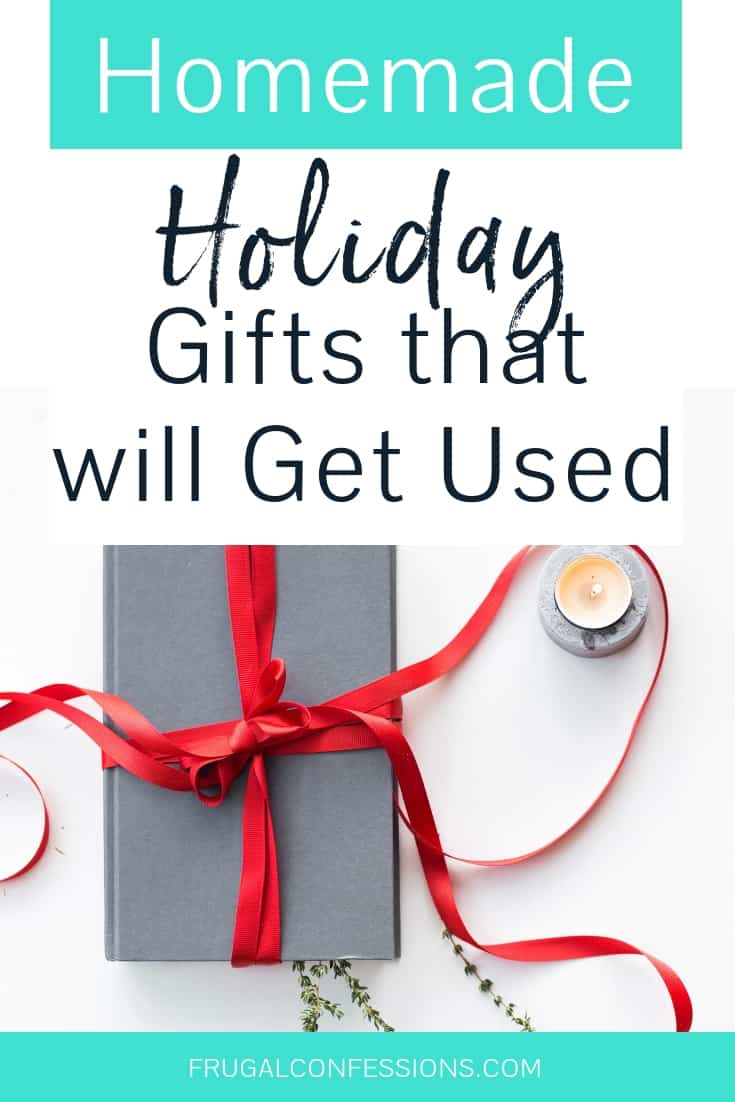 gift wrapped in a grey box with a red ribbon on a desk with text overlay 