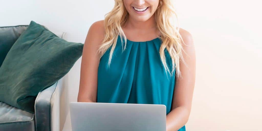 screenshot of woman on laptop getting free products from companies to review