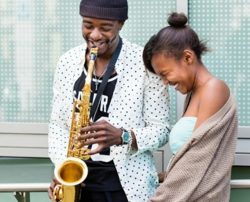 boyfriend playing saxophone for girlfriend's top 10 Valentine gifts for girlfriend