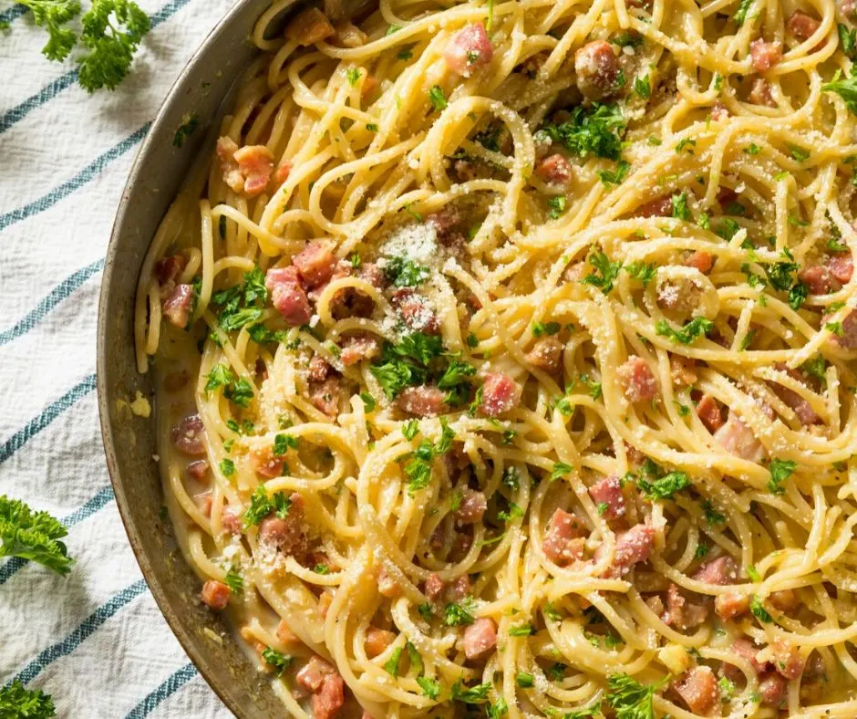pan of hot carbonara, one of the great inexpensive meals for large groups