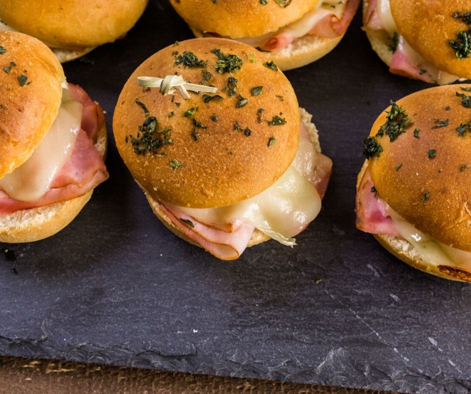 ham and cheese sliders on slate serving platter, great winter meals for a group 