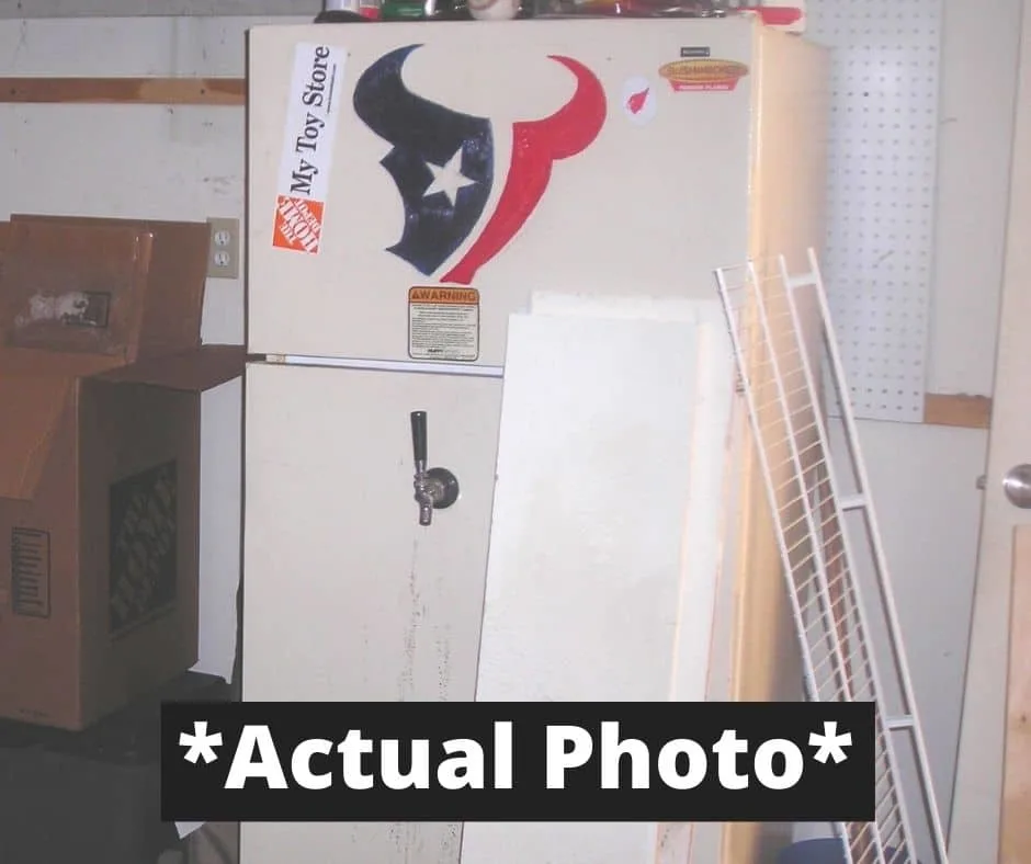 our used refrigerator that we sold with Texans logo painted on front - sell used appliances for cash