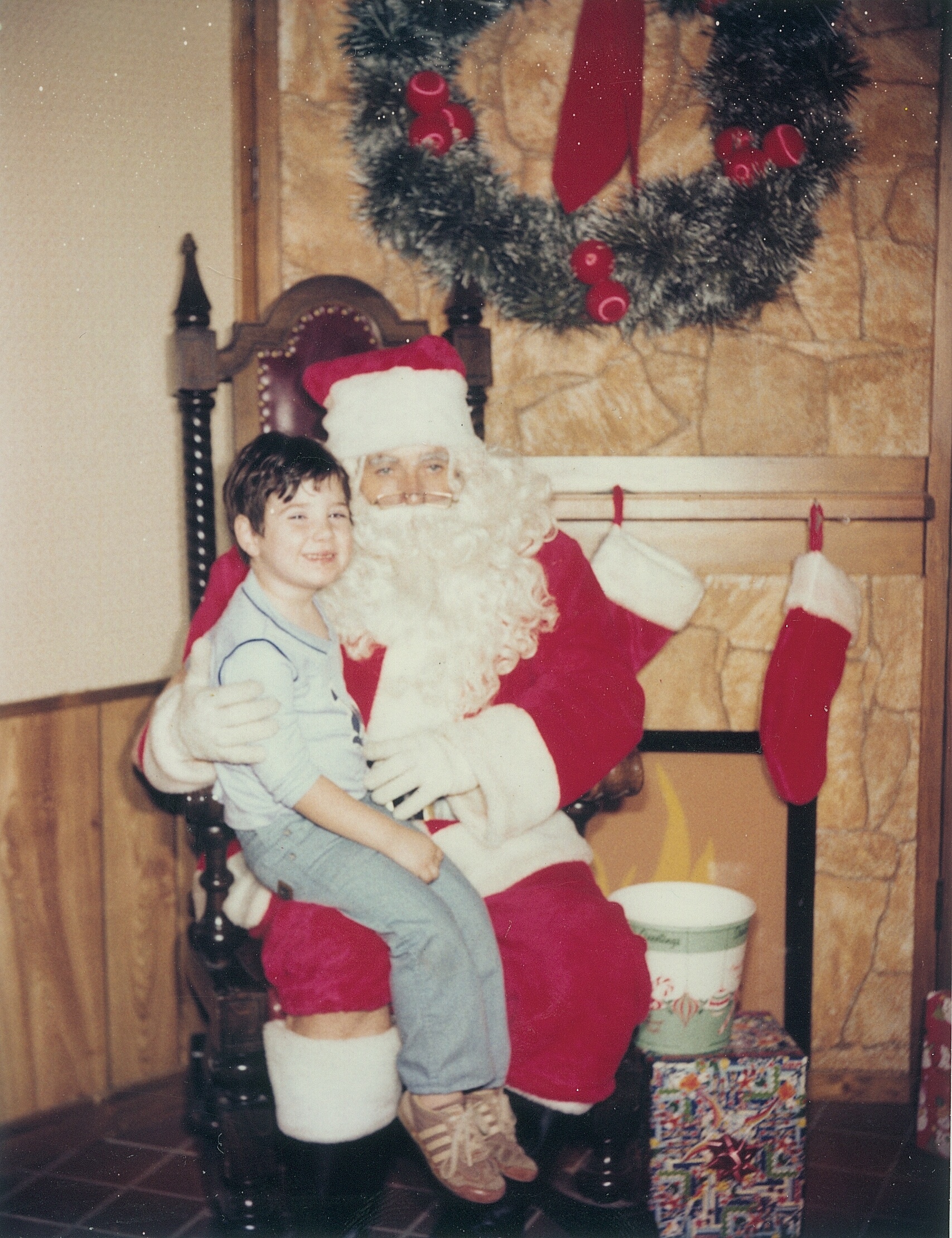 author's husband when he was 6, sitting on Santa's lap