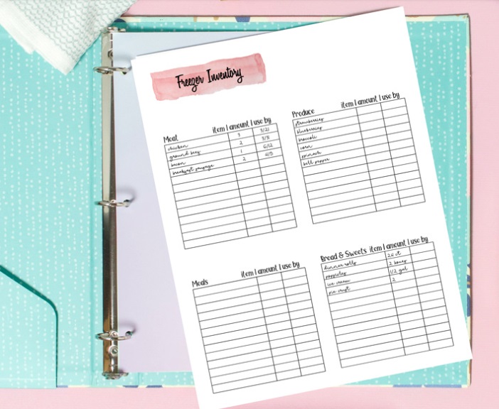 freezer inventory written on pink watercolor header, with boxes for different categories of food