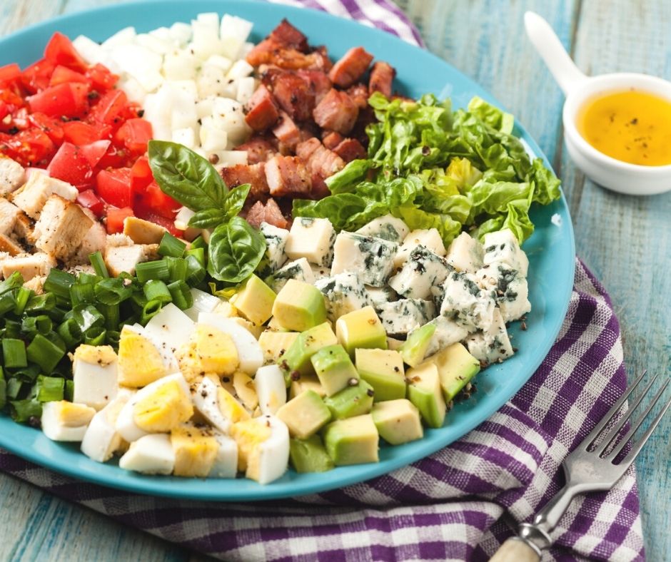 cobb salad platter for large group on blue plate