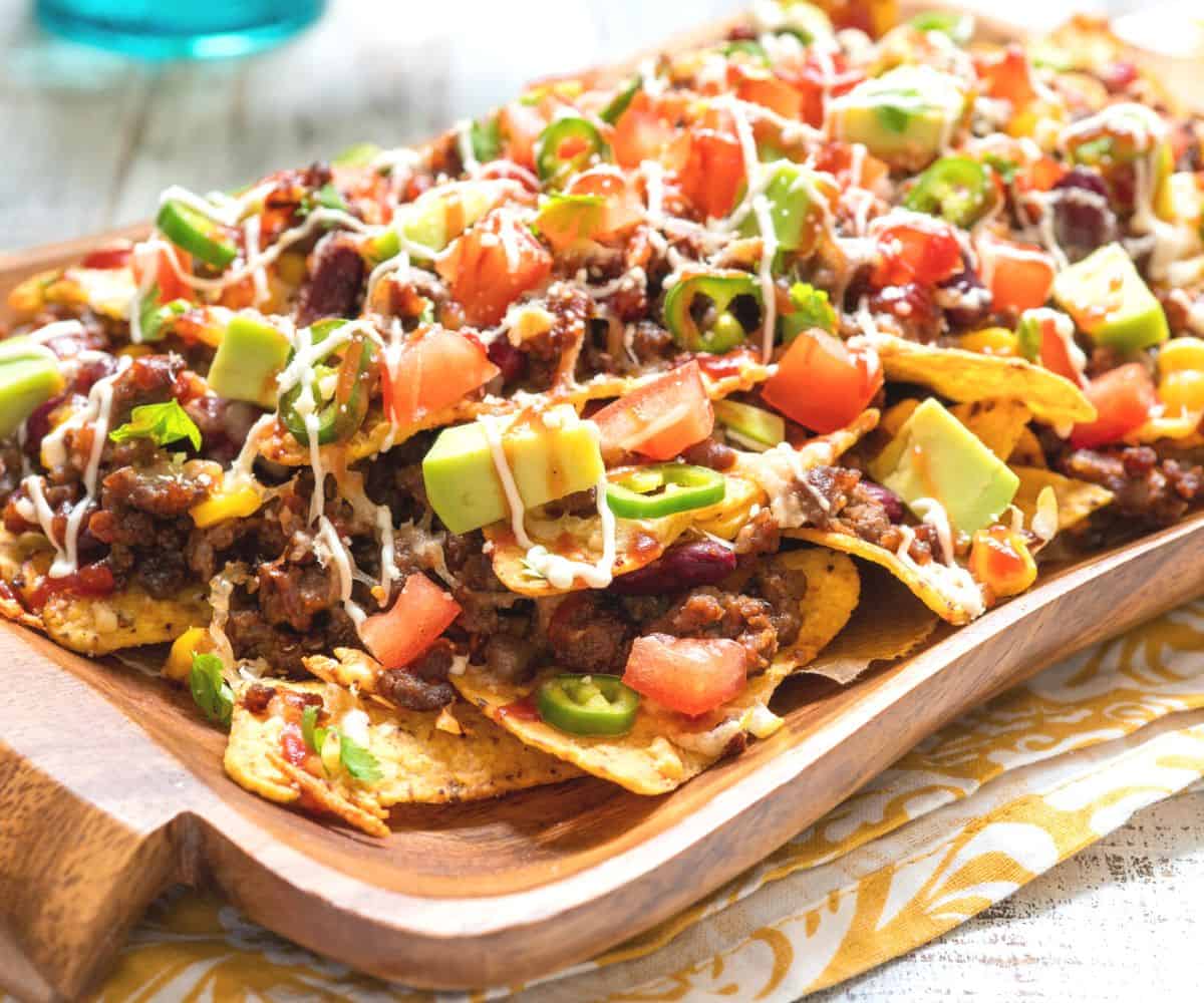 giant board of nachos on a table