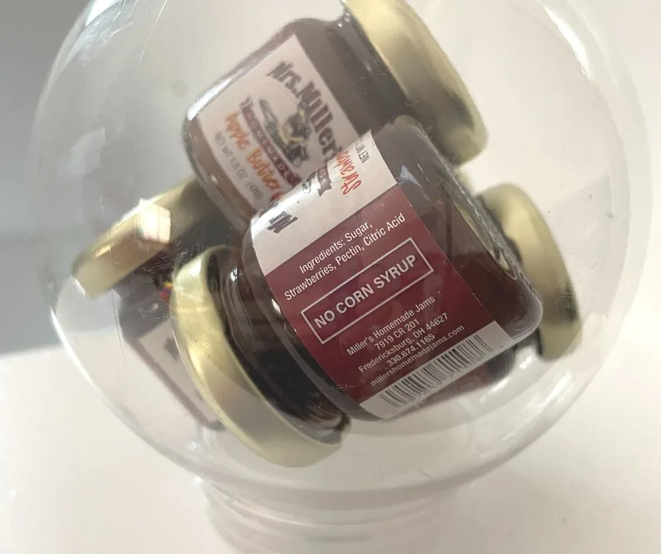 jams and spreads in a plastic snow globe from Dollar Tree