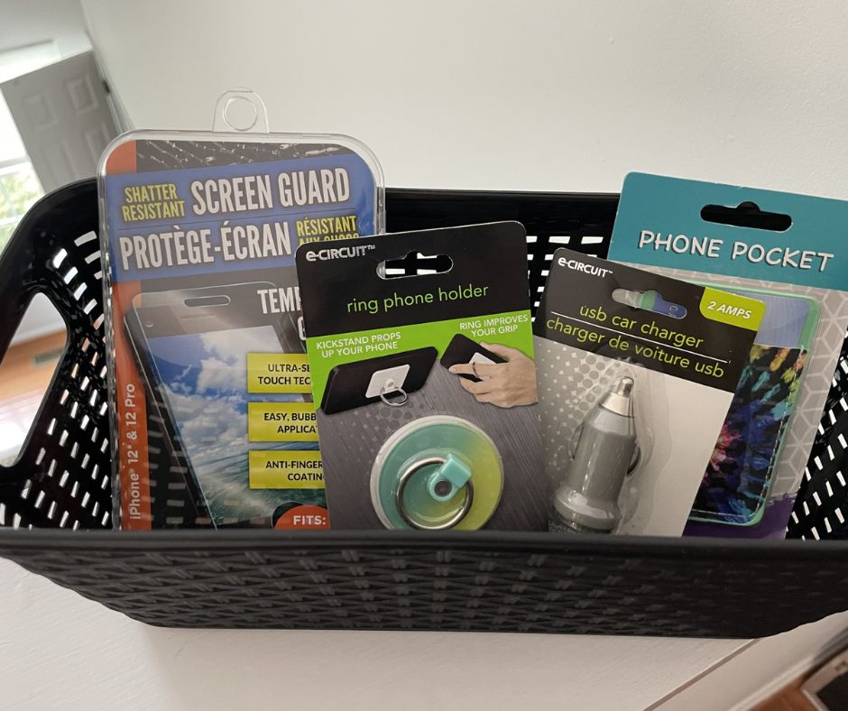 black storage basket with phone pocket, screen guard, ring phone holder, etc.