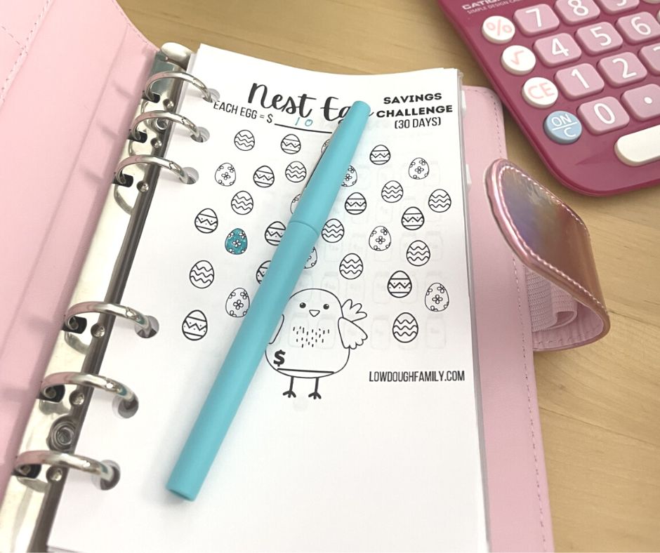 sheet of little Easter eggs and chick to color in free printable savings challenge in pink A6 binder