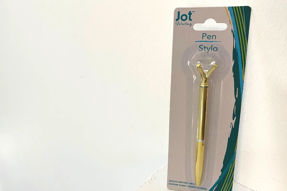 gold pen with fake diamond on top