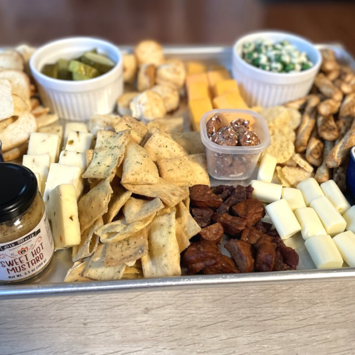 large charcuterie board on silver tray from Dollar Tree