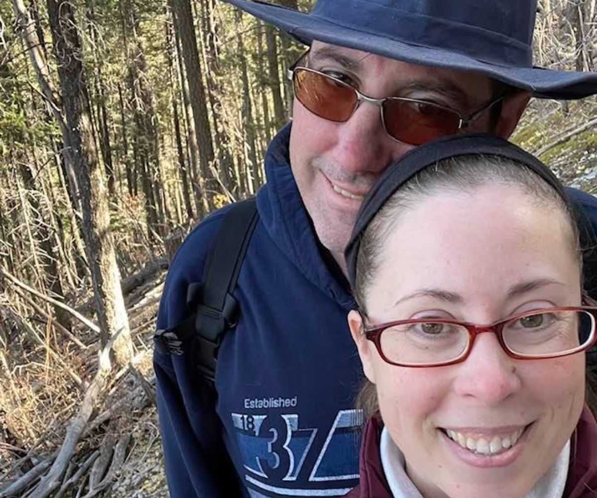 couple smiling together in New Mexico wilderness