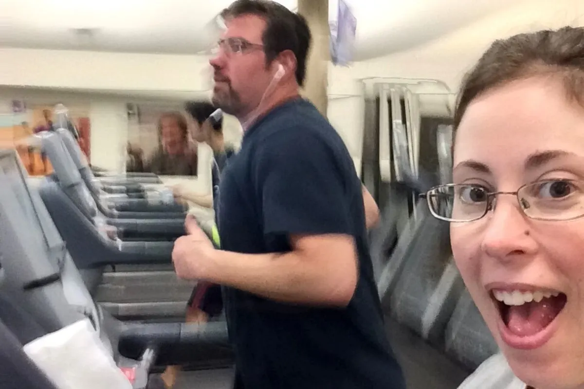 author and husband working out at JCC for date night with a baby