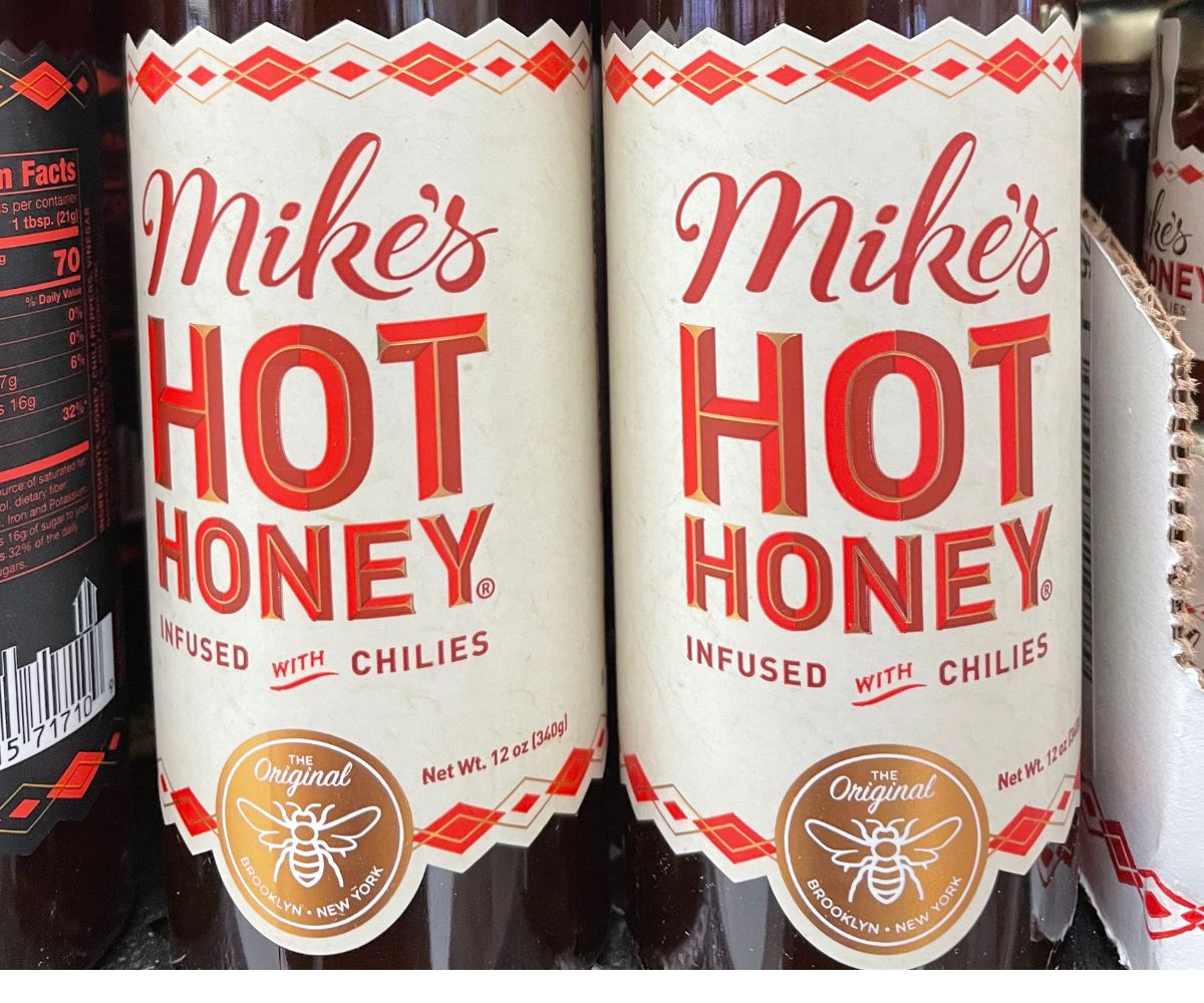 two bottles of Mike's Hot Honey infused with Chilies