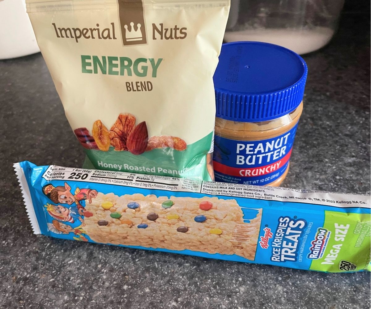 package of trail mix, peanut butter, and Rice Krispies treats from Dollar Tree