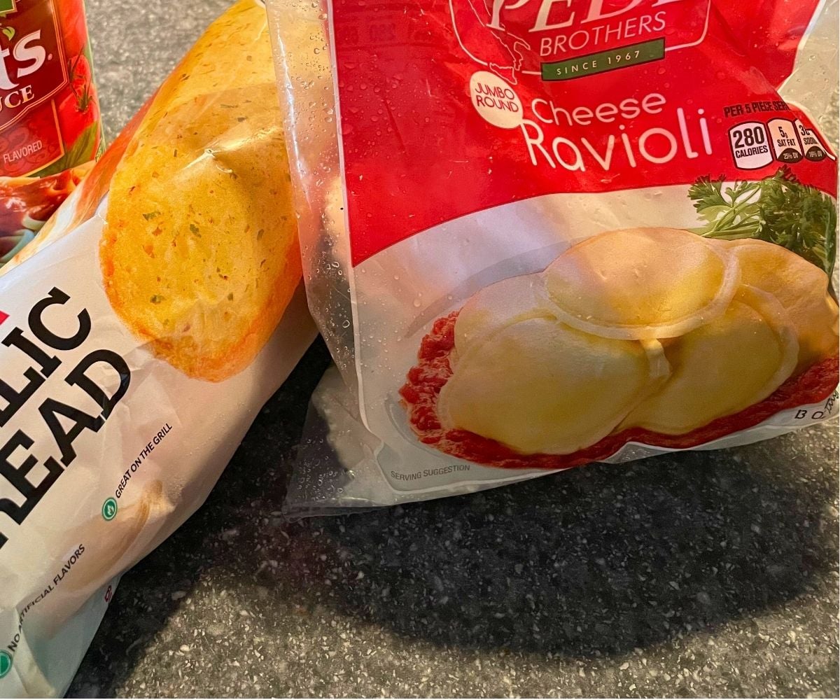 three ingredients for ravioli with garlic bread