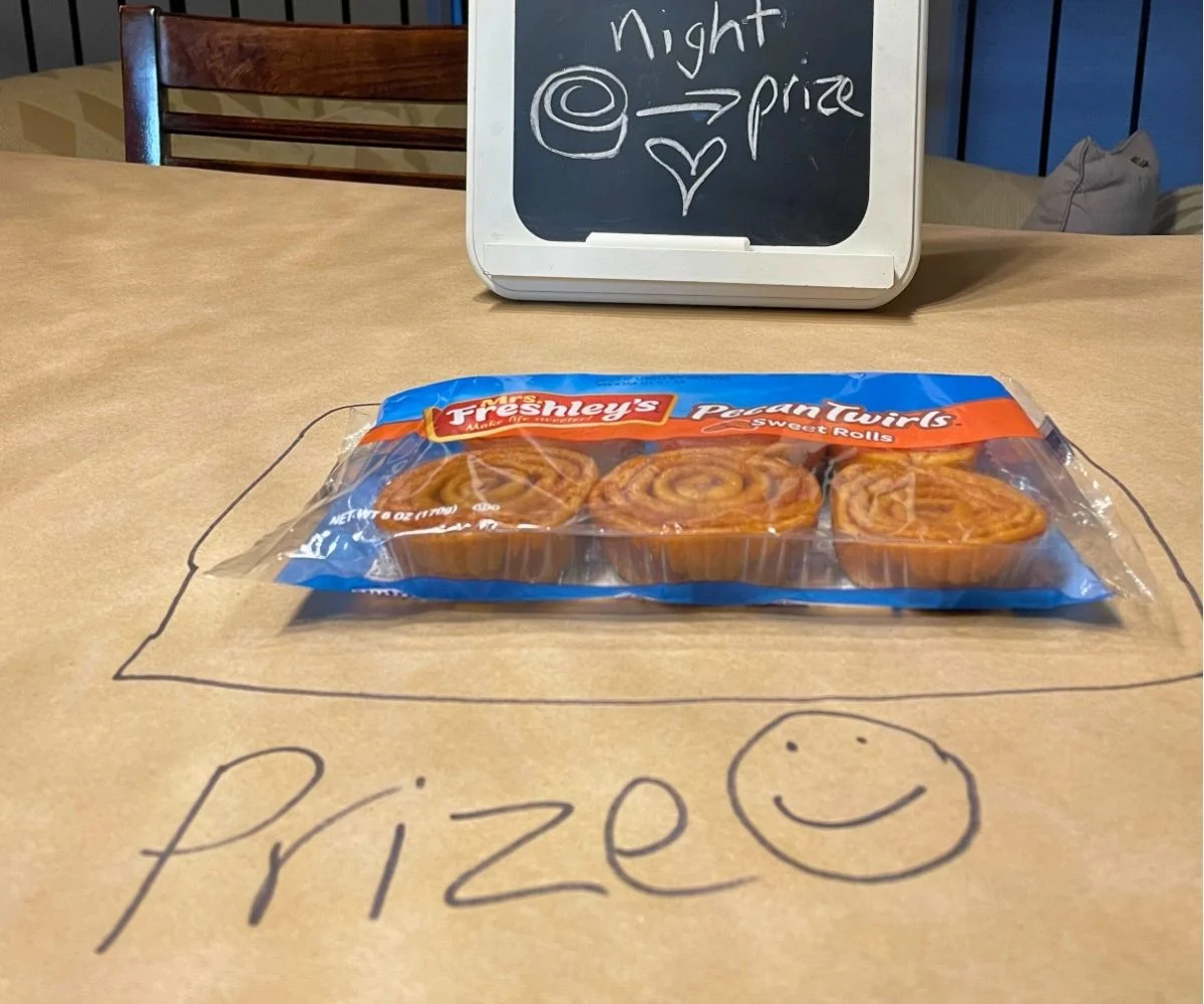 bag of Pecan Twirls with square around it in marker, and "Prize" and smiley face