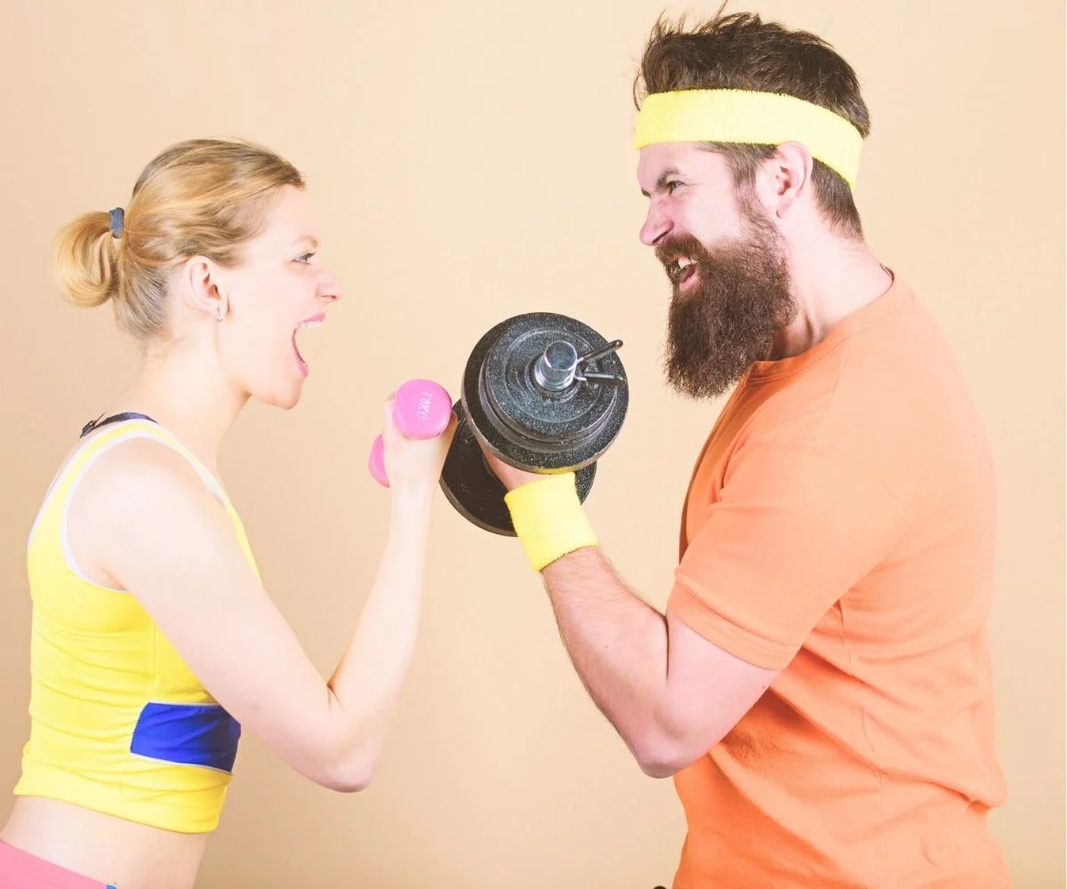 couple in bright workout gear with headband looking funny