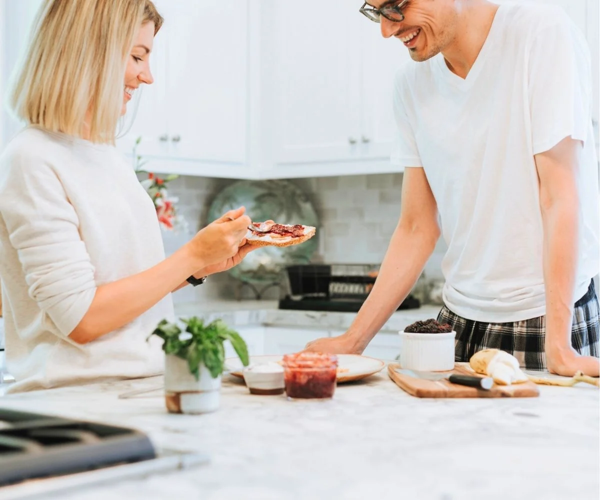 couple eating their freezer jam they made together