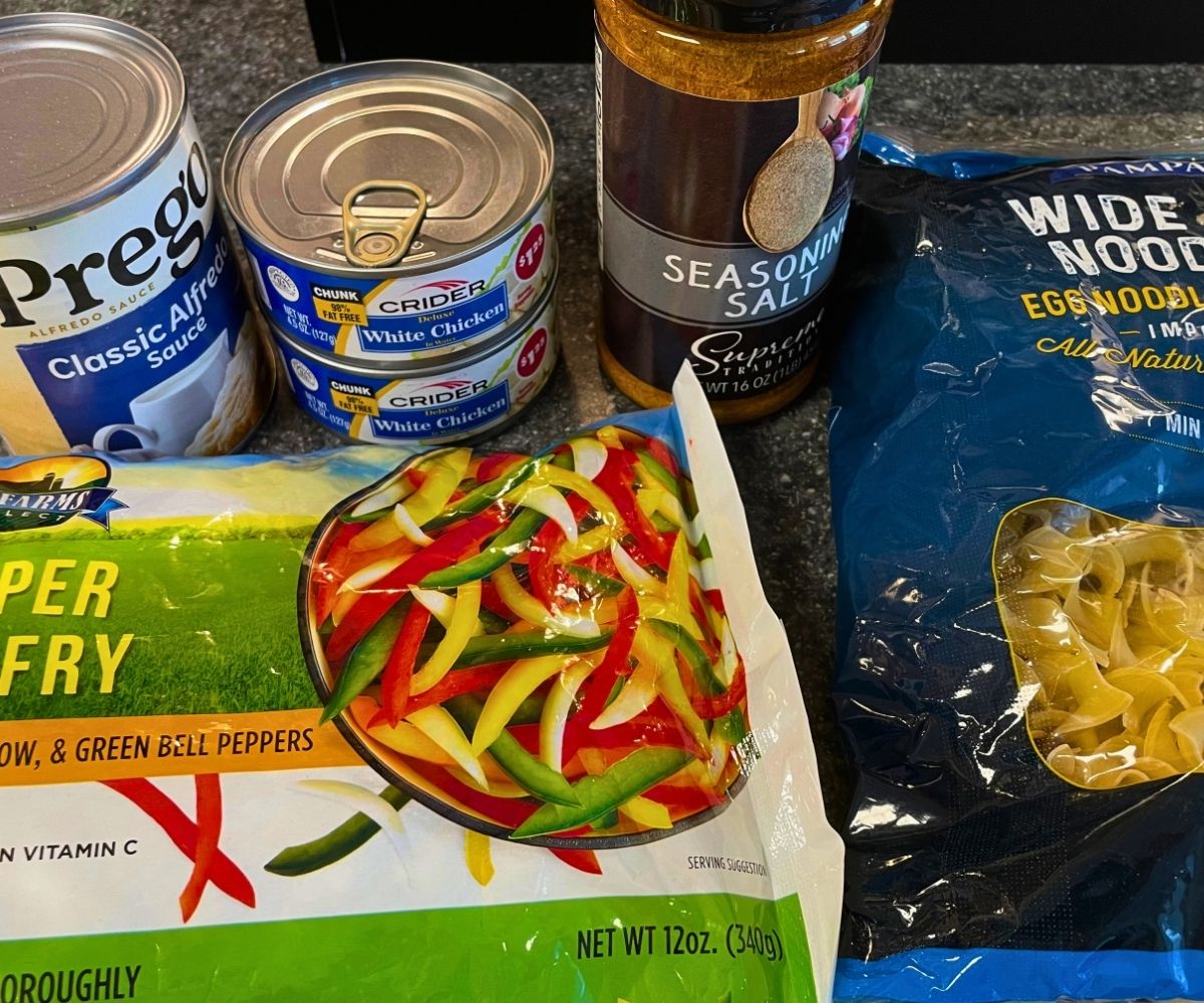photo of all ingredients for cajun chicken alfredo bake casserole on counter