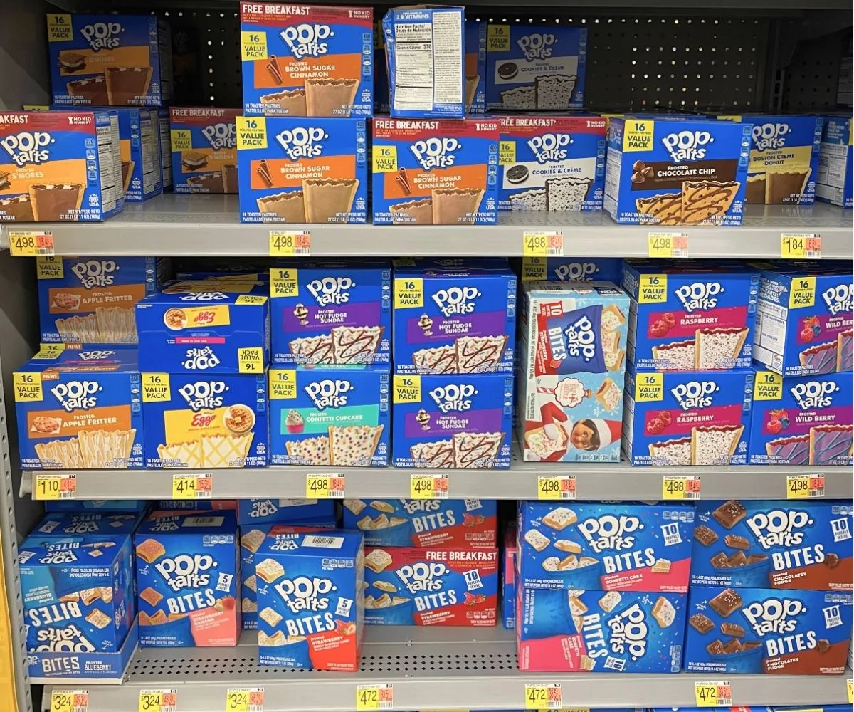 three shelves of various Pop-Tart flavors at Walmart