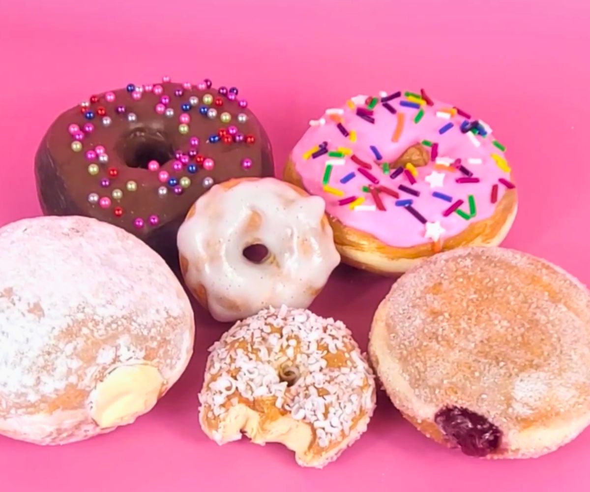 mini crafted donuts on bright pink background that look real! 
