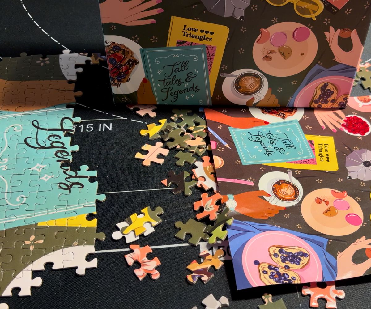 fun, modern-looking puzzle on a black puzzle mat you can roll up while you're midway through